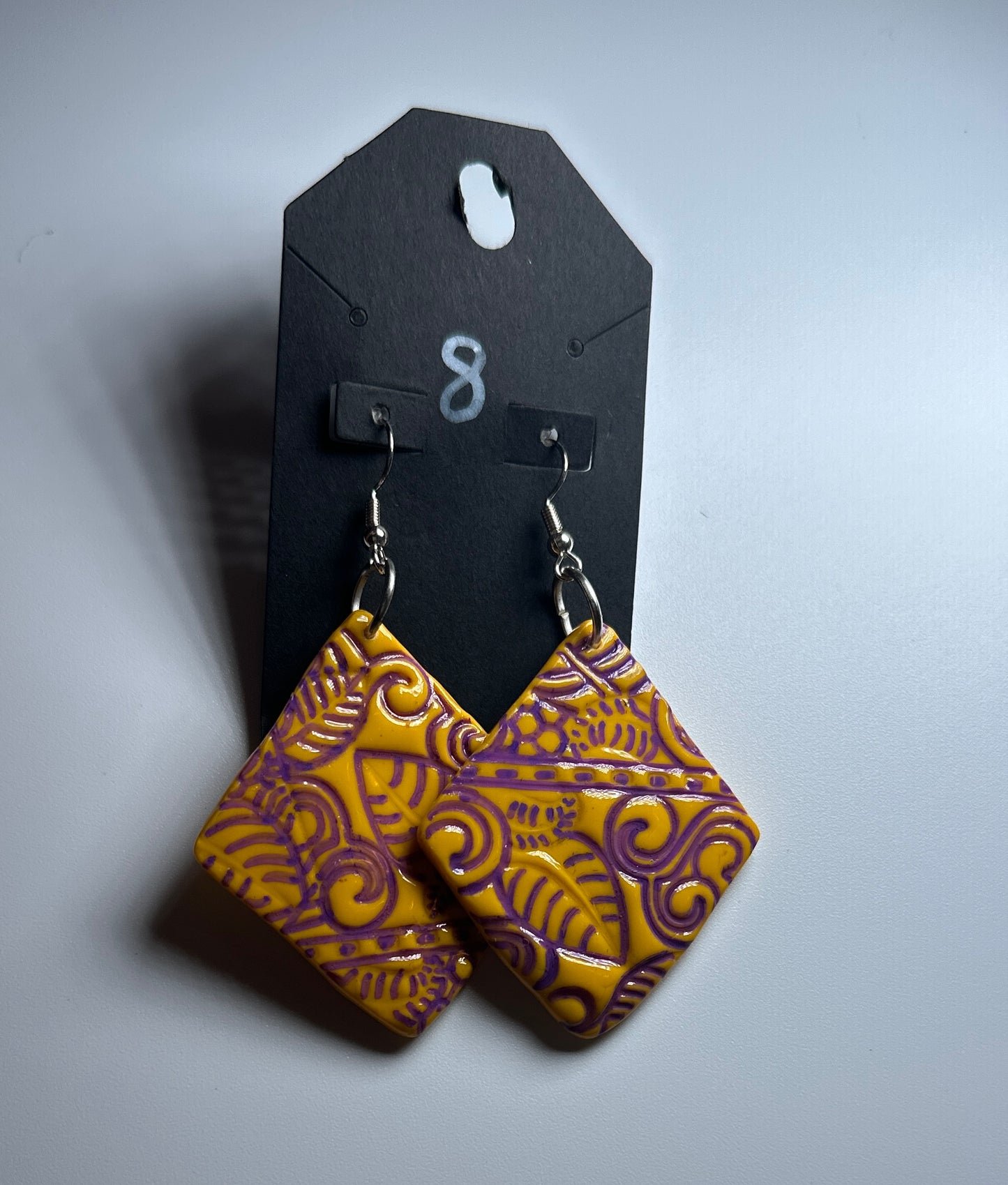 Royal Riddim – Embossed Clay Dangle Earrings